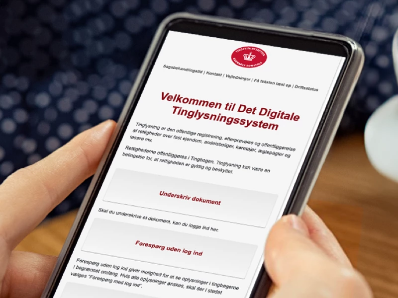 Telefon med velkomst til Det Digitale Tinglysningssystem
